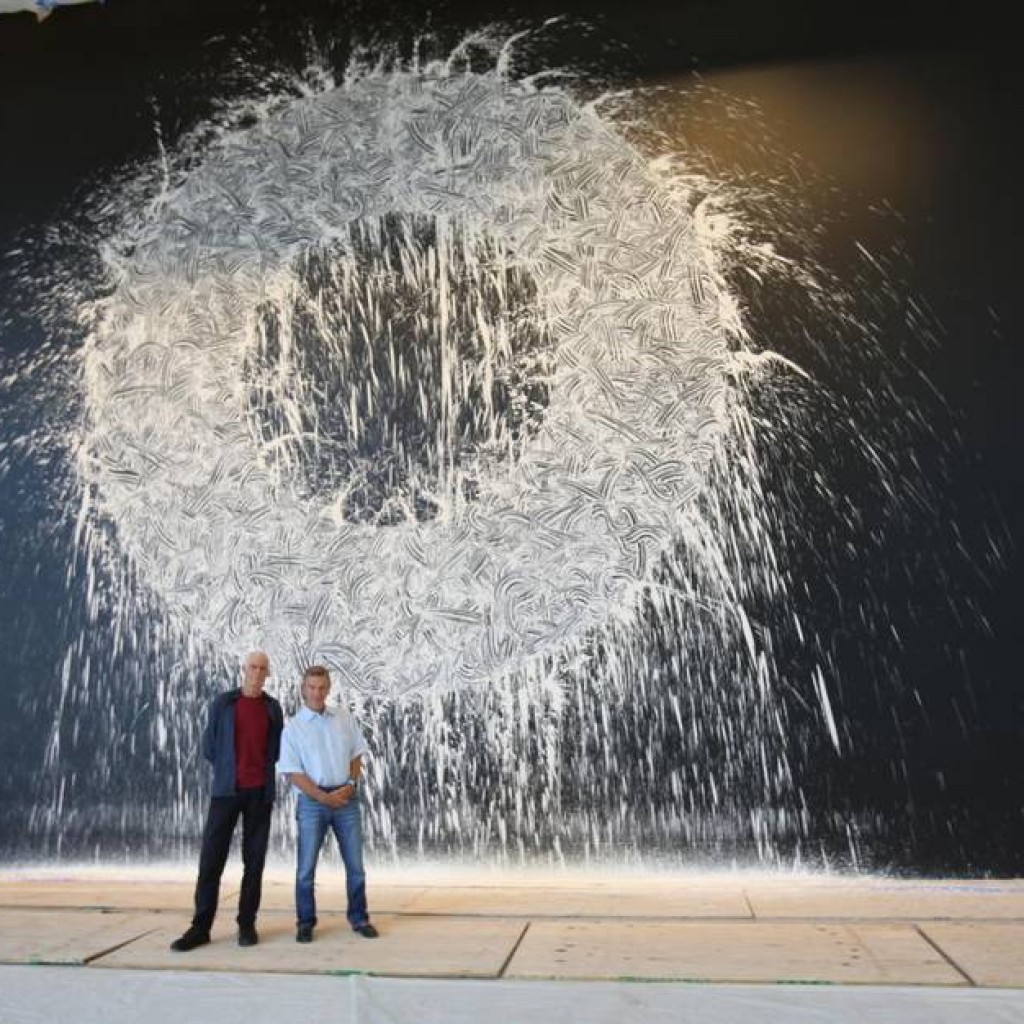 Richard Long and Craig Hall standing in front of 'Dallas Rag' painting